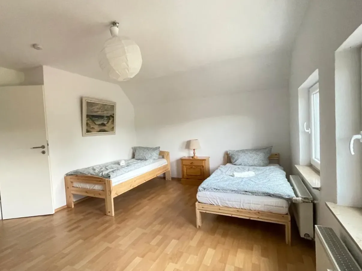 Raiffeisenstraße 49 · Wohnung 1 — Schlafzimmer 4
